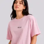 pink shirt wearing ny women
