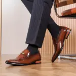 men ankle wearing brown shoes