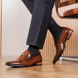 men ankle wearing brown shoes